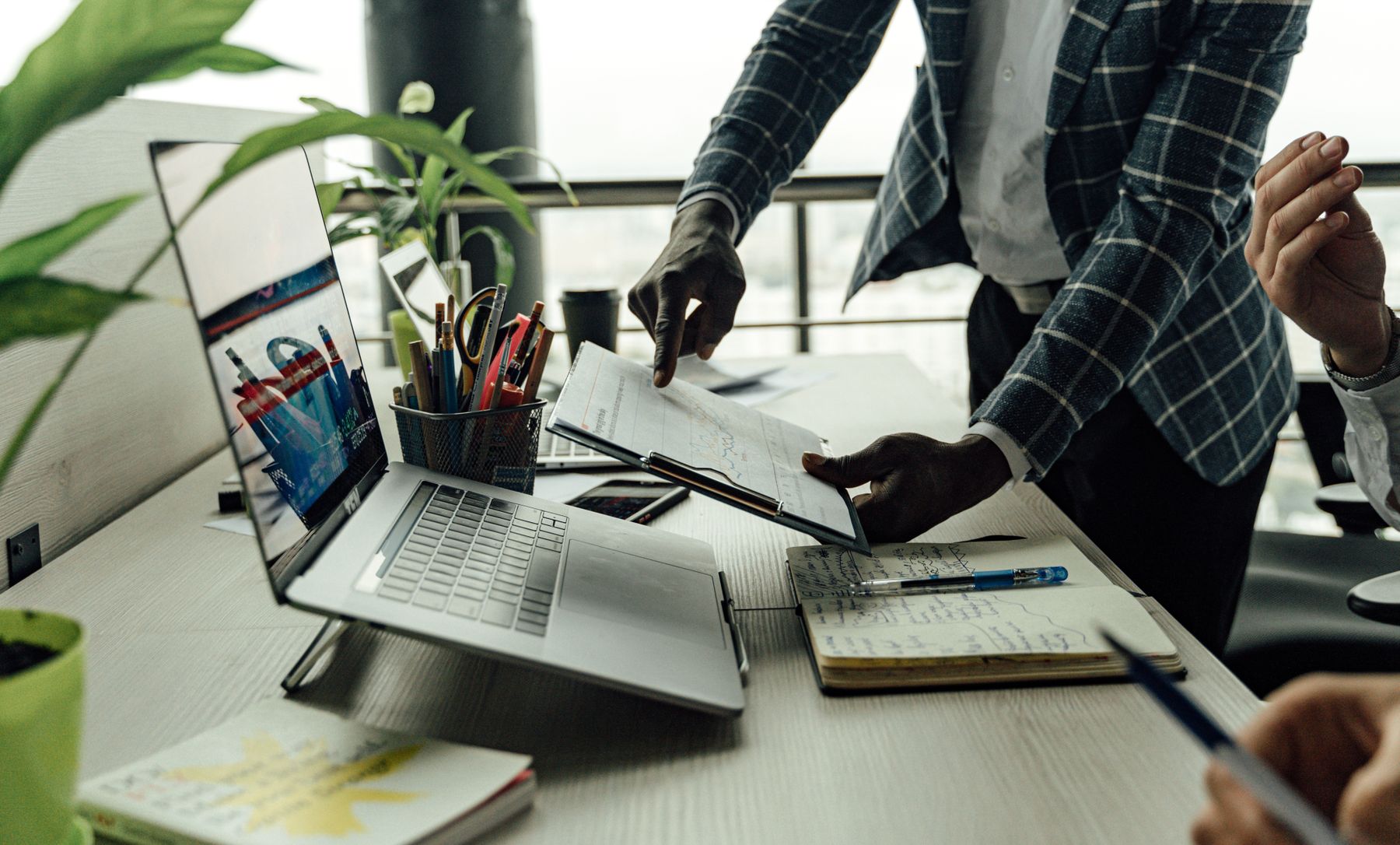 Analysts reviewing financial reports and charts